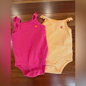 Carter’s Infant Girls Onesie pack of 2 - size‎ 9 mos